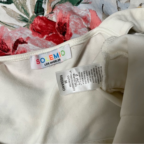 Solemio White Crop Tank w/ Small Cut Outs - Picture 8 of 8